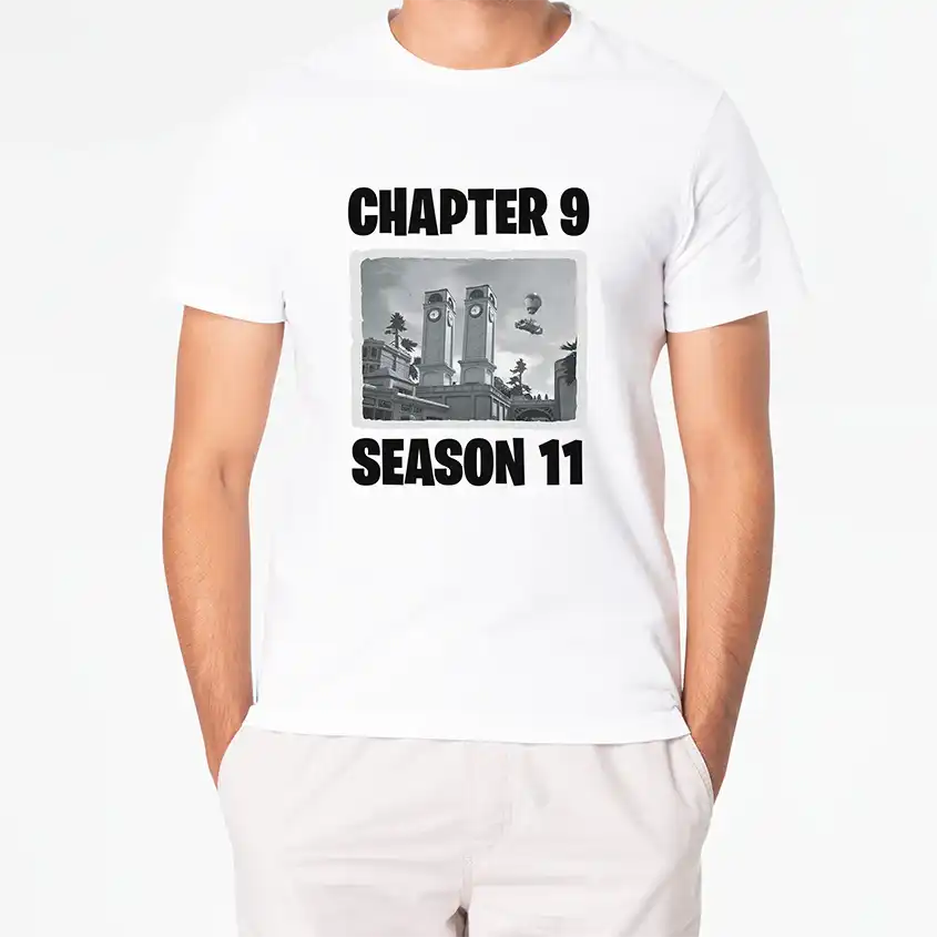 Biała koszulka z nadrukiem CHAPTER 9 SEASON 11 oraz grafiką miasta z wieżami zegarowymi