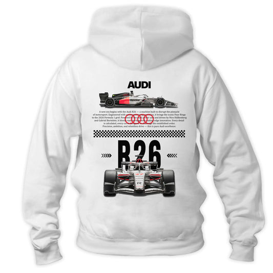 Biała Bluza z kapturem typu kangurka widziana od tyłu, z potężnym, technicznym nadrukiem halftone bolidu Formuły 1 Audi R26 na plecach na sezon 2026